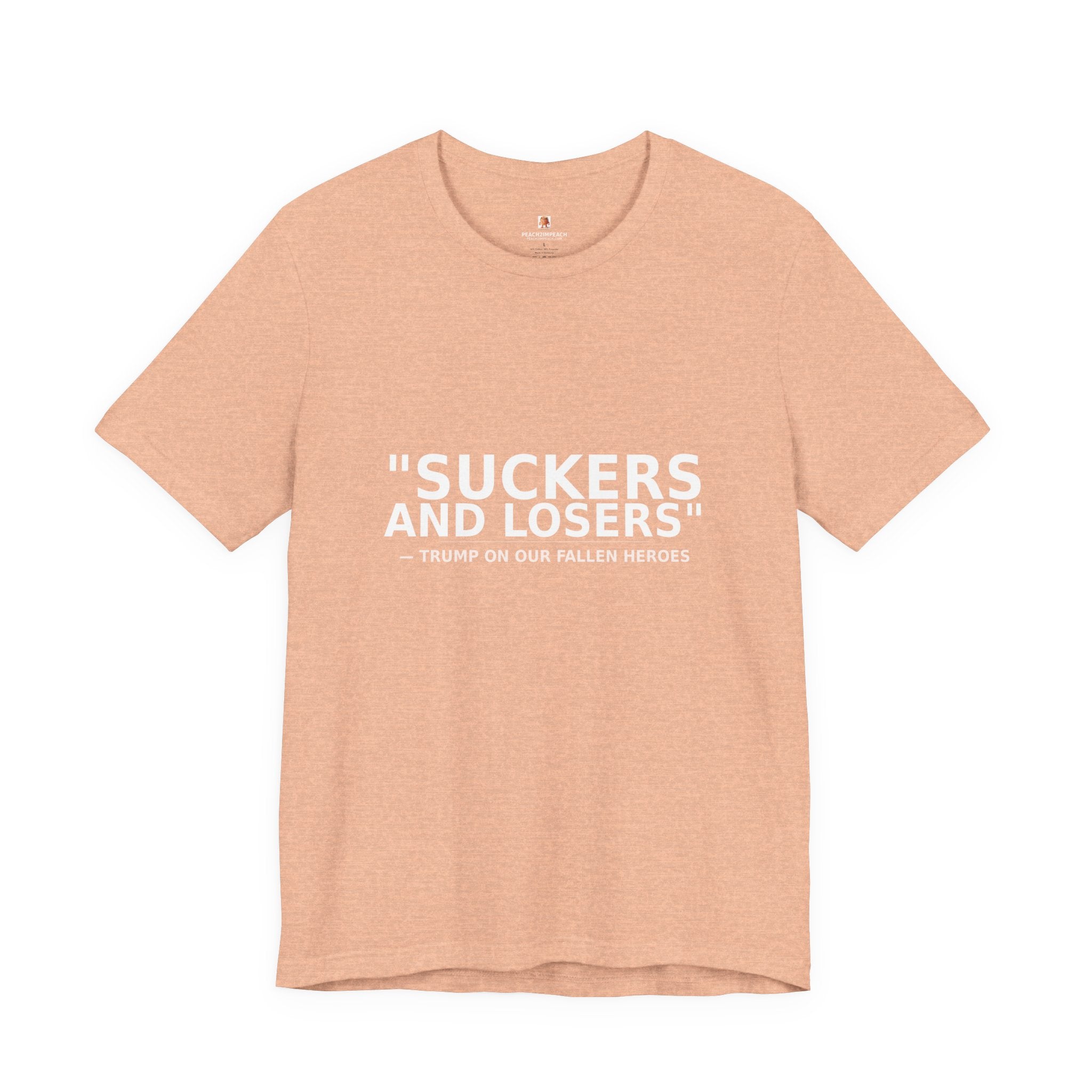 Front view of peach Suckers and Losers t-shirt with white protest text honoring fallen soldiers by Peach2Impeach