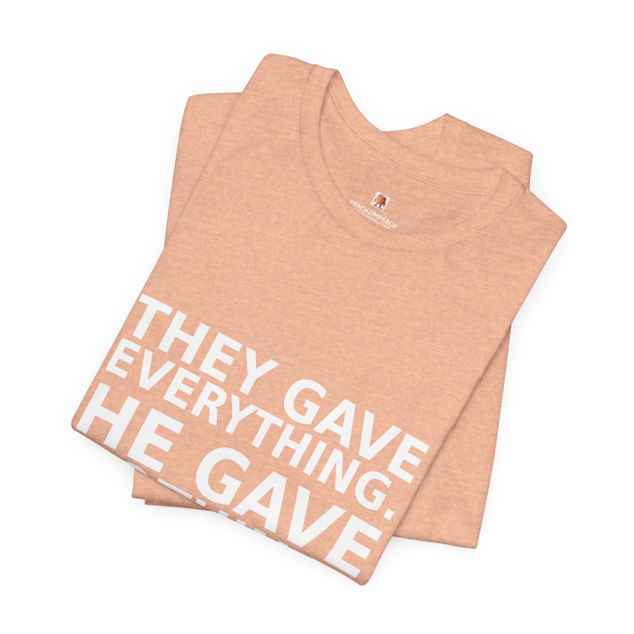 Angled lifestyle view of peach They Gave Everything He Gave Nothing military tribute t-shirt by Peach2Impeach