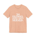 Folded peach 34 Felonies Zero Days Served Trump conviction protest t-shirt by Peach2Impeach